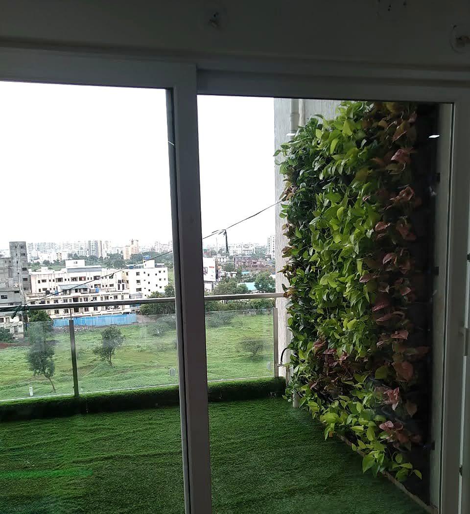 The wall seen from inside the apartment, with the city beyond